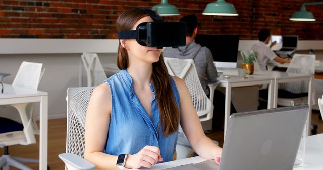Young Woman Using Virtual Reality Headset in Modern Office - Download Free Stock Images Pikwizard.com