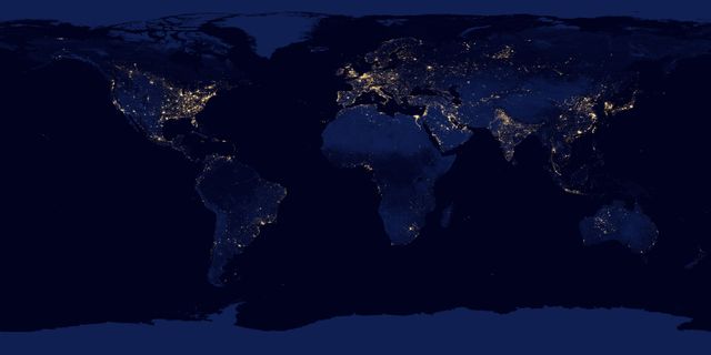 Map of the world shown at night with city lights illuminating regions of high population density. Useful for educational purposes, illustrating global urbanization and population distribution, and geography projects. Can be used in presentations, travel planning, and environmental studies.