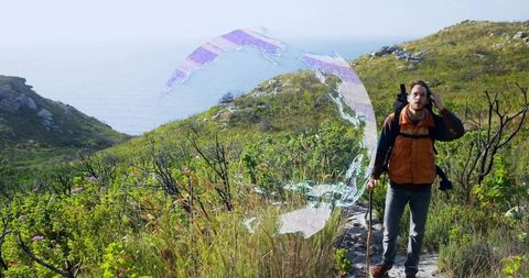 Hiker enjoying scenic coastal trail experience