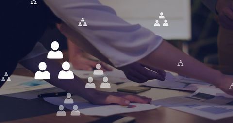 Team Collaborating in Office with Overlay of Social Media Icons