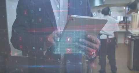 Business Professional Integrating Data Technology in Industrial Kitchen