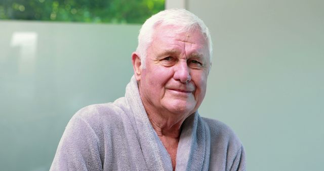 Elderly Man Smiling in Soft Bathrobe Outdoors - Download Free Stock Images Pikwizard.com