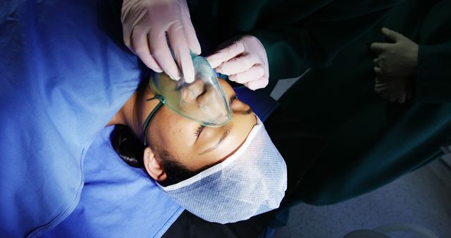 Patient Receiving Oxygen in Operating Room Before Surgery - Download Free Stock Photos Pikwizard.com