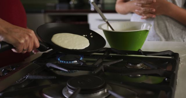 Cooking Pancakes on Gas Stove - Download Free Stock Images Pikwizard.com