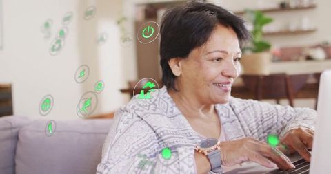 Senior woman integrating eco-friendly living and technology at home