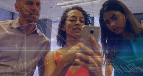 Colleagues Analyzing Stock Market Data on Smartphone