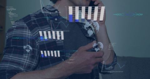 Man holding phone while viewing augmented reality business charts and holographic interface