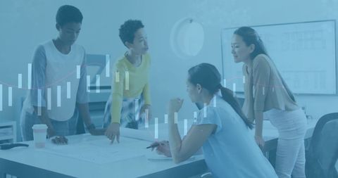 Diverse Team Analyzing Financial Data for Business Strategy