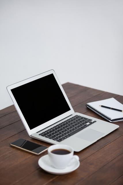 Office Desk with Laptop, Coffee, and Notebook - Download Free Stock Images Pikwizard.com