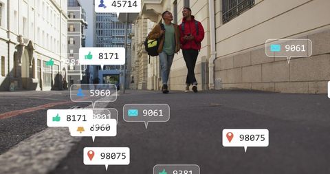 Two Friends Discussing Social Media on City Street