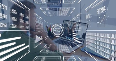 Data analyst working with holographic dashboards over laptop in modern home office