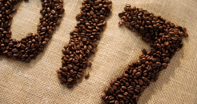 Coffee Beans Forming Year Characters on Burlap Canvas - Download Free Stock Images Pikwizard.com