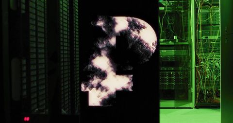 Digital Cloud Icon Overlaid on Data Center Server Racks