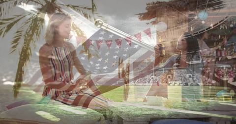 Woman Relaxing Outdoors at Tropical Coastal Cafe with Pennant Banners