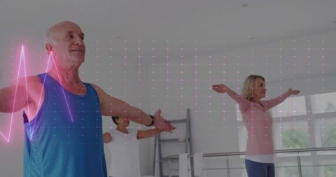 Senior Man Exercising at Ballet Barre with Heart Rate Overlay