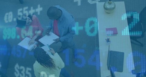 Team discussing financial data overlay in modern office