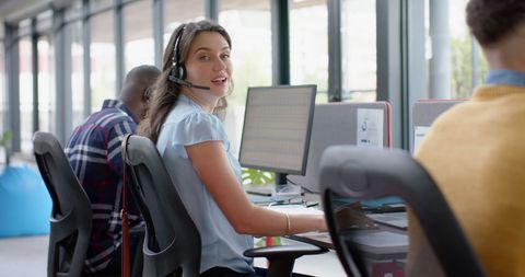 Confident Businesswoman Communicating Through Headset in Office - Download Free Stock Images Pikwizard.com