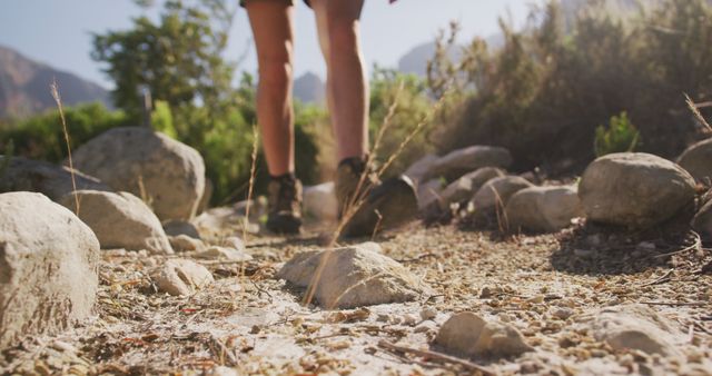 Close-Up of Hiker's Feet Walking on Rocky Path in Nature - Download Free Stock Images Pikwizard.com