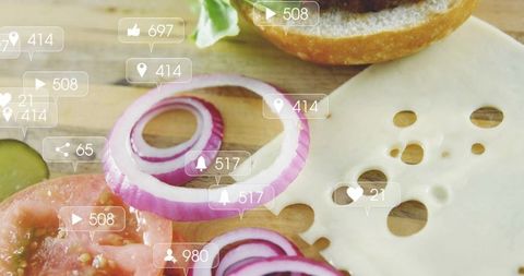 Stacked red onion rings on swiss cheese with social media overlay icons for marketing