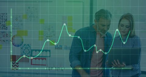 Colleagues Analyzing Data with Graph Overlay in Office - Download Free Stock Images Pikwizard.com
