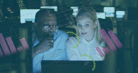 Diverse professionals analyzing financial data on computer screens