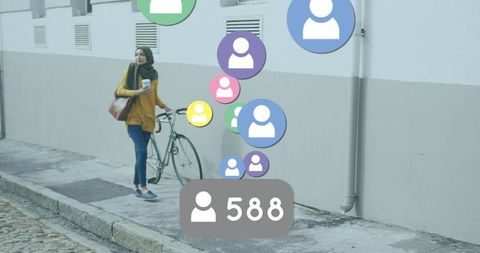 Woman in Hijab Navigating Social Media Metrics with Bicycle on Urban Street - Download Free Stock Images Pikwizard.com