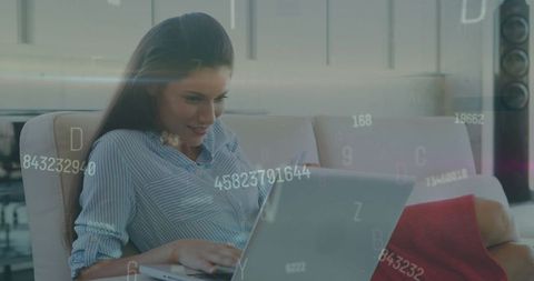 Woman engaging in online transactions on laptop for global finance