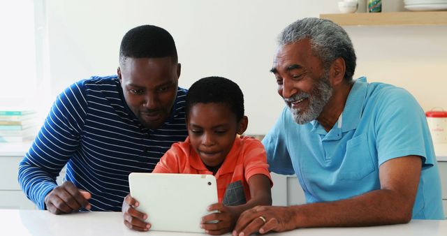 Multigenerational Family Enjoying Tablet Together at Home - Download Free Stock Images Pikwizard.com