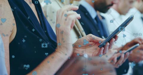 Business Professionals Engaging with Digital Technology and Devices