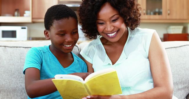 Mother and Son Reading a Book Together at Home - Download Free Stock Images Pikwizard.com