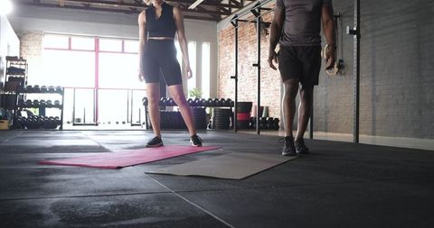 Diverse training partners preparing for a workout session
