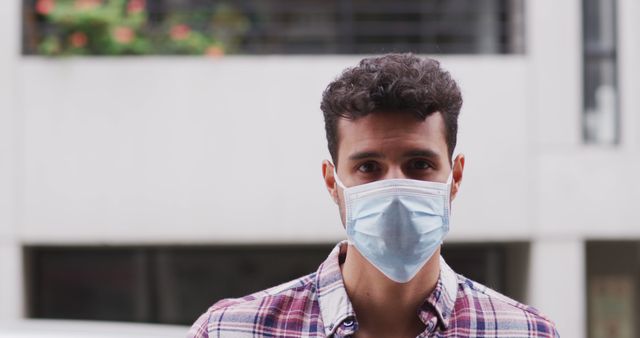 Young Man Wearing Protective Mask Outdoors - Download Free Stock Images Pikwizard.com