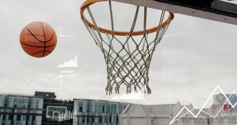 Basketball soaring toward braided net with data overlays, rooftop urban sports analytics