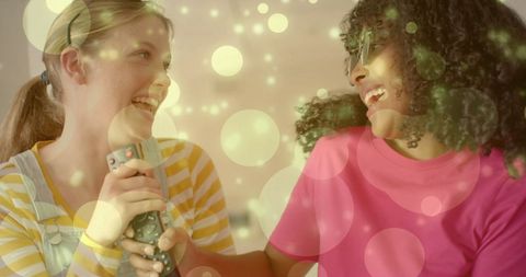 Teenage girls enjoying weekend karaoke at home