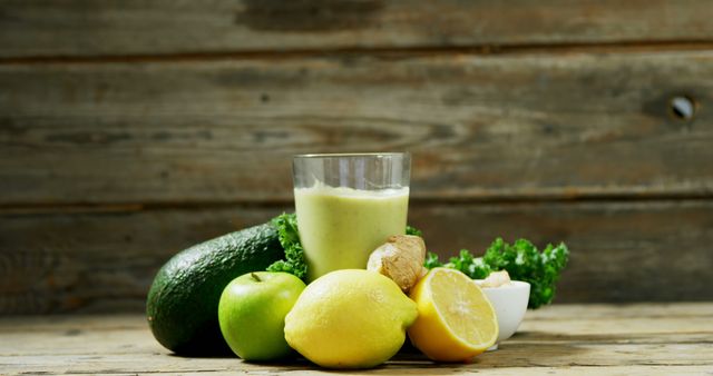 Healthy Green Smoothie with Fresh Ingredients on Wooden Table - Download Free Stock Images Pikwizard.com