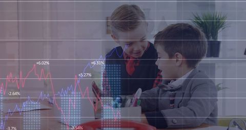 Young entrepreneurs analyzing financial data on laptop