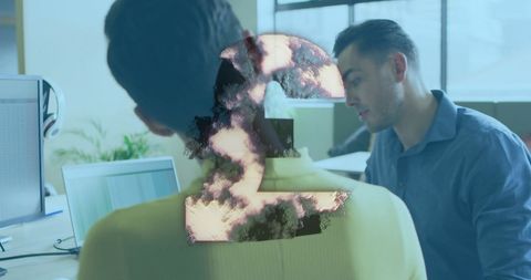 Office teamwork with engraved transparent number two