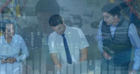 Diverse Business Team Analyzing Data on Laptop in Office