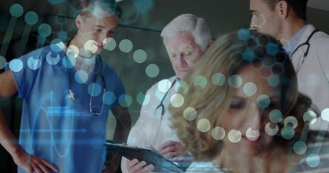 Medical team reviewing genomic diagnostics on tablet with DNA data overlay in clinic