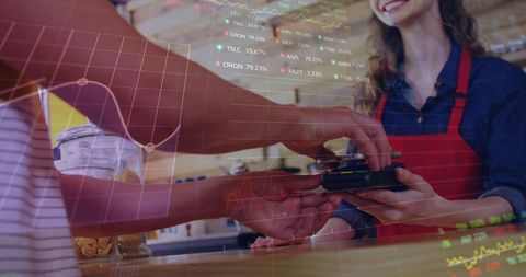 NFC Mobile Payment in Cafe with Stock Market Overlay