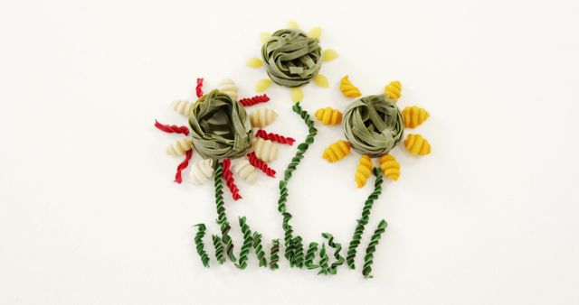 Creative Floral Arrangement Made of Assorted Pasta on White Background - Download Free Stock Images Pikwizard.com