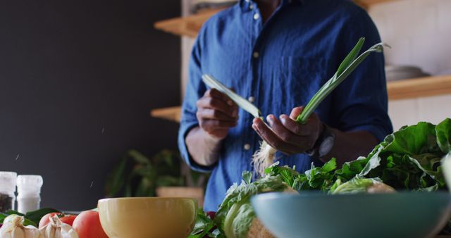 Man Preparing Vegetables in Rustic Kitchen - Download Free Stock Images Pikwizard.com