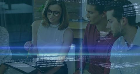 Team analyzing data on tablet with augmented reality overlays and visualization