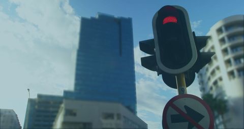 Traffic Light Against Urban Skyline Scenic View - Download Free Stock Images Pikwizard.com