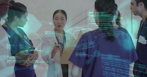 Clinical team briefing with holographic medical data visualization in hospital corridor