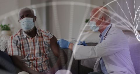 Doctor Administering Vaccine to Senior Male Patient