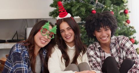 Diverse Friends Celebrating Festive Christmas with Laughter and Joy