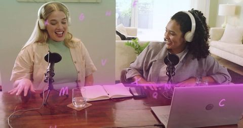 Recording podcast together at home with laptop, condenser microphones, headphones, notebook