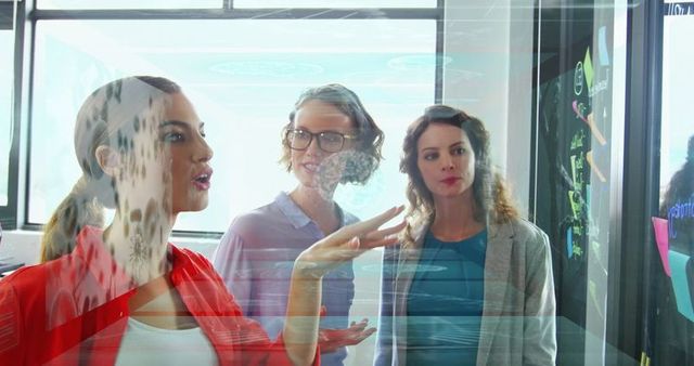 Business team analyzing digital information on interactive display