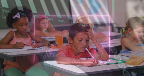 Elementary student focusing on writing at desk with colorful neon overlay and double exposure